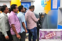 Before anti black money day another atm dispenses fake rs 2000 note