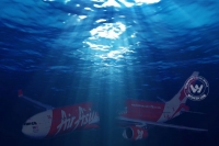 Air asia flight found in sea official statement has given some dead bodies also collected