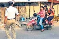 Young woman misbehaves with traffic si in kadapa