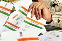 Companies violating aadhaar card norms may soon be fined by uidai