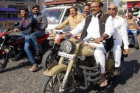 Bhopal mp alok sanjar pays fine apologises for helmet less motorcycle ride
