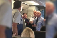 American airlines suspends worker after altercation seen on video