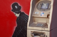 Man shows his protest this way after atm does not dispences cash