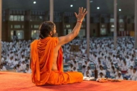 Ramdev expresses discontent over income tax relief for salaried class