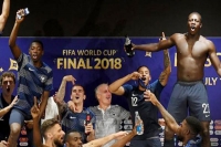 French players crash press conference to celebrate world cup triumph