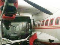 Passenger coach crashes into stationary plane at kolkata airport