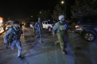 Taliban attack near afghan parliament kills more than 30