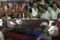 Muthuvel karunanidhi laid to rest at marina between mentor and arch rival