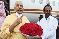 Kcr receives opposition s presidential candidate yashwant sinha at hyderabad airport