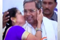Cm gets a kiss from woman in a public programme