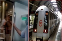 Delhi metro runs with door open on yellow line