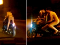Naked woman caught on camera riding on the back of a motorbike through the streets