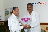 Governor narasimhan praised minister harish rao
