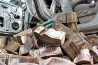 Police found one and half crore rupees in a car at suryapet busstand