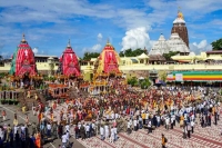 Puri rath yatra holy trinity placed atop chariots after pahandi prez pm greet people