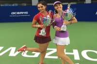 Sania mirza martina hingis win guangzhou open title