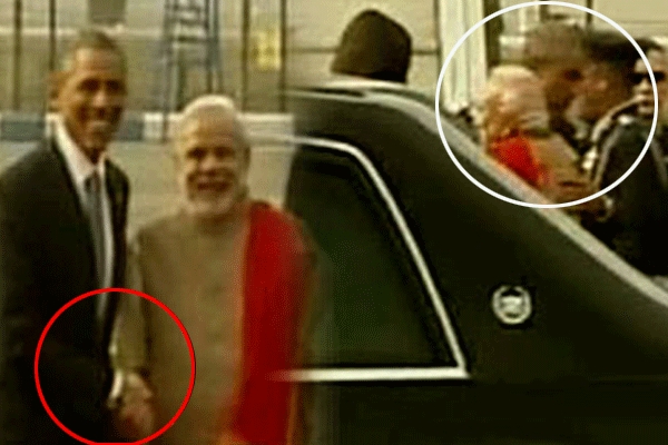 Narendra modi shakes a hand gives a hug to barrack obama