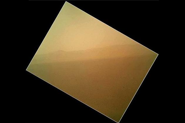 Mars rover Curiosity sends home first colour photo 