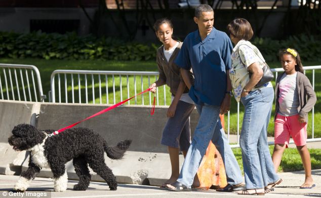 Barack Obama narrowly avoids a family feud after suggesting his dog Bo has more charisma than his mother-in-law