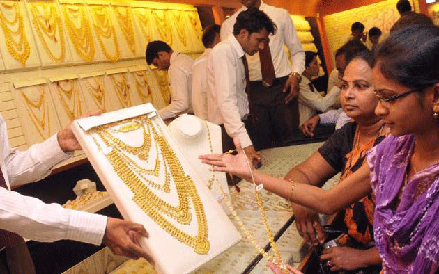 Gold price hits record in India; track overseas mkts 