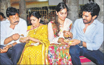 Ram Charan , Upasana arrive in Tirumala 