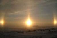 Three suns in sky