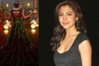 Anushka sharma wearing a 35 kg gown