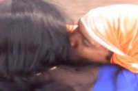 Kissing baba arrested in kadapa