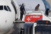 Libyan plane hijacked 29 passengers released from afriqiyah airways flight in malta