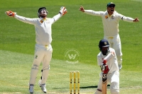 Australia wins first test with 48 runs
