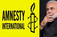 Amnesty international criticise modi