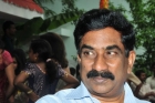 Arrest warrant issued against andhra jyothy md radha krishna