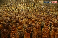 Chinese man made army of buddhas