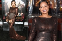 Christina milian flashes assets in see through gown