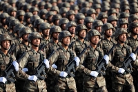 China announces cuts of three lakhtroops at military parade showing its might