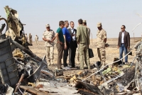 Russian plane crash investigators say airbus broke up in midair over desert
