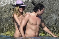 Heidi klum defends topless holidays with boyfriend