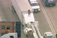 Naked woman dancing on top of truck shuts down highway 290