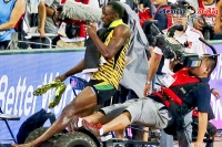 Usain bolt gets taken down by clumsy cameraman on segway