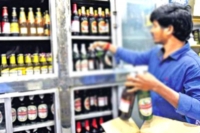 Liquor rates revised to combat smuggling avoid sanitiser deaths in andhra pradesh