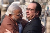 Foreign media vulgar news on modi hollande hug