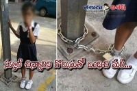 Malaysian woman locks 8 year old daughter to lamp