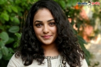 Nitya menon rejected by a director for not accepting liplock with hero tollywood gossips
