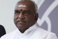 Slipper hurled at union minister pon radhakrishnan during jnu student s last rites