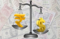 Rupee trades lower against us dollar