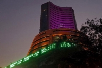 Sensex ends at record high nifty above 9250
