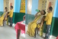 Up teacher suspended after video of student massaging her goes viral