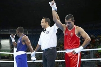 Boxer vikas krishan advances to pre quarters