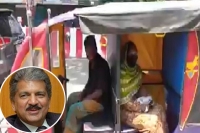 Anand mahindra is all praises for e rickshaw driver s social distancing innovation
