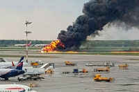 41 dead as russian plane bursts into flames on landing